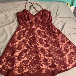 Burgundy and nude lace dress.